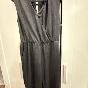 Black glitter  sleeveless jumpsuit.